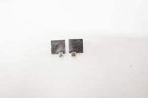 Pendientes de plata con diamante en bruto.