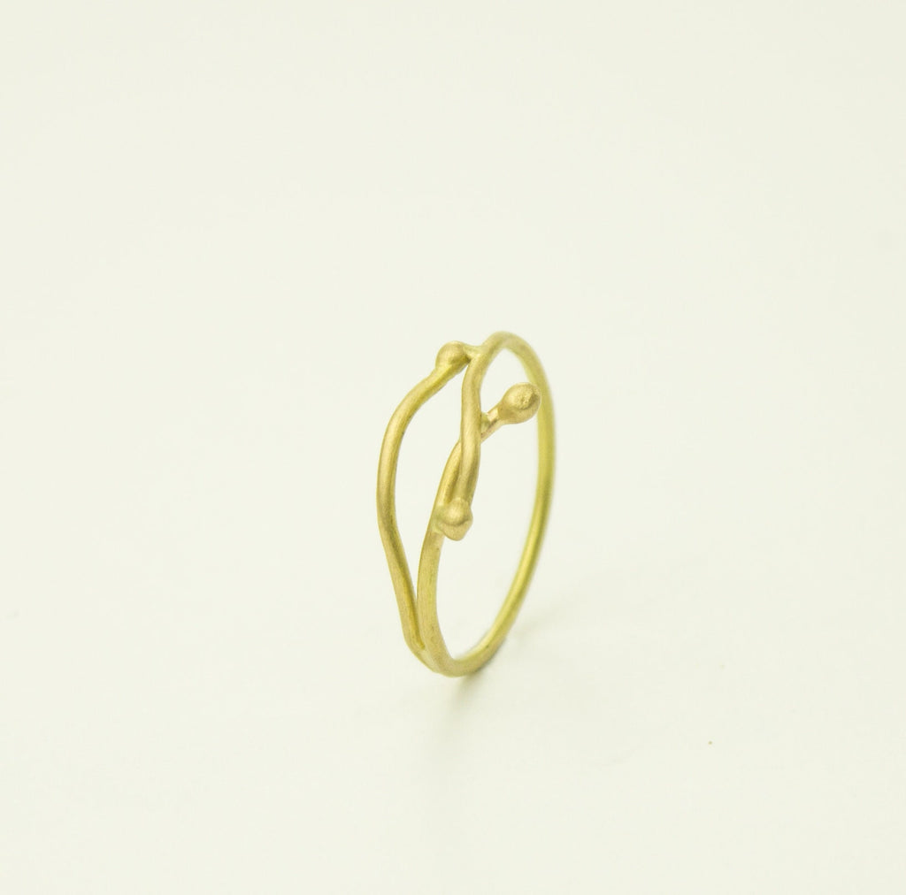 Anillo fino de oro amarillo de 18 kt