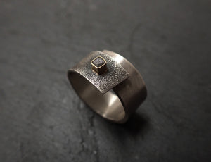 Anillo abierto de plata y oro con diamante en bruto